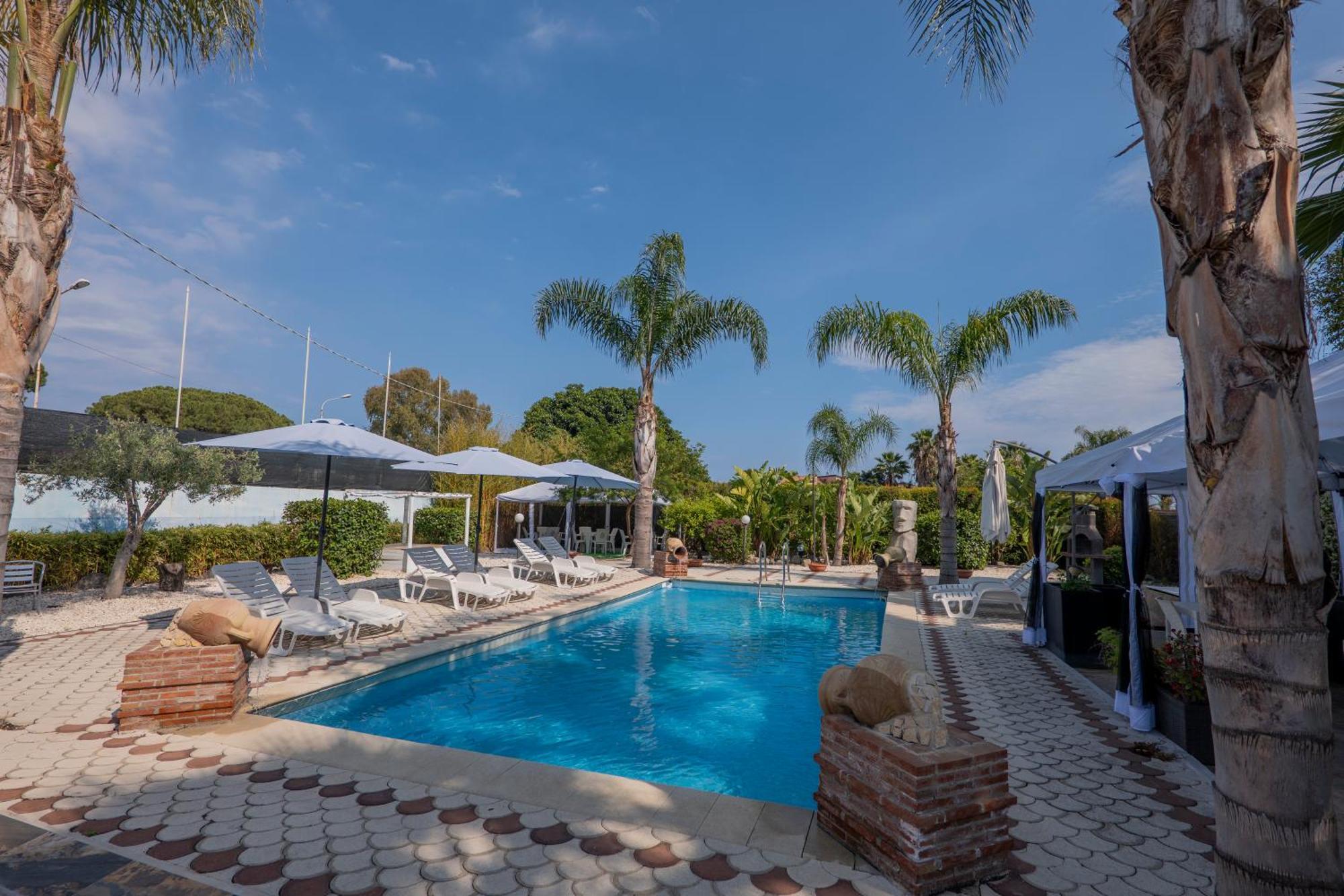 Villa Seta จีอาร์ดีนี นักซอส ภายนอก รูปภาพ