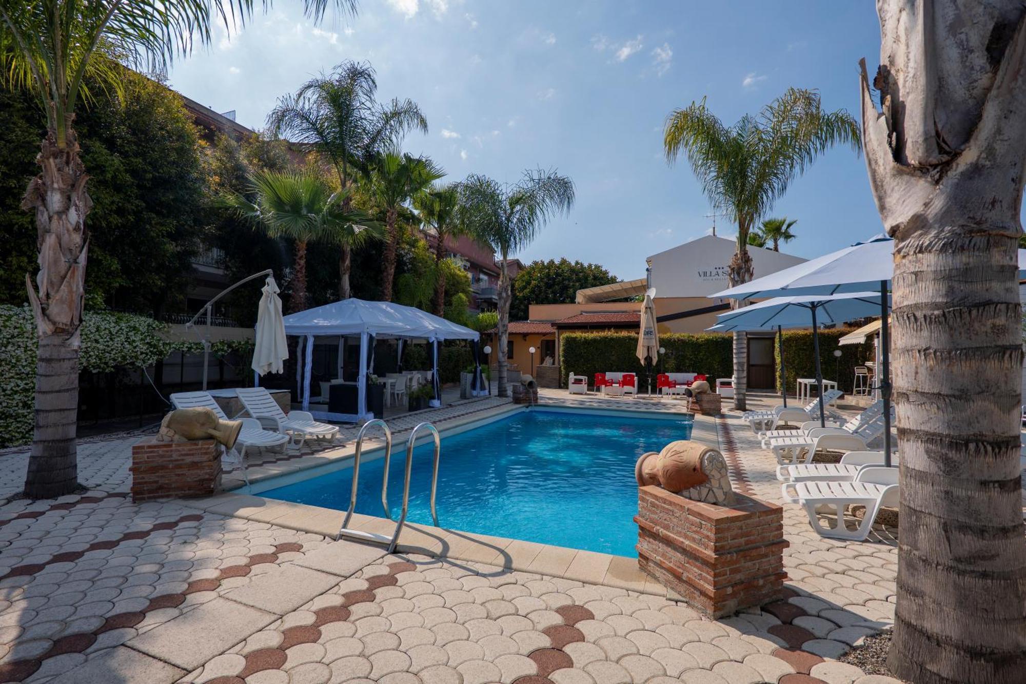Villa Seta จีอาร์ดีนี นักซอส ภายนอก รูปภาพ