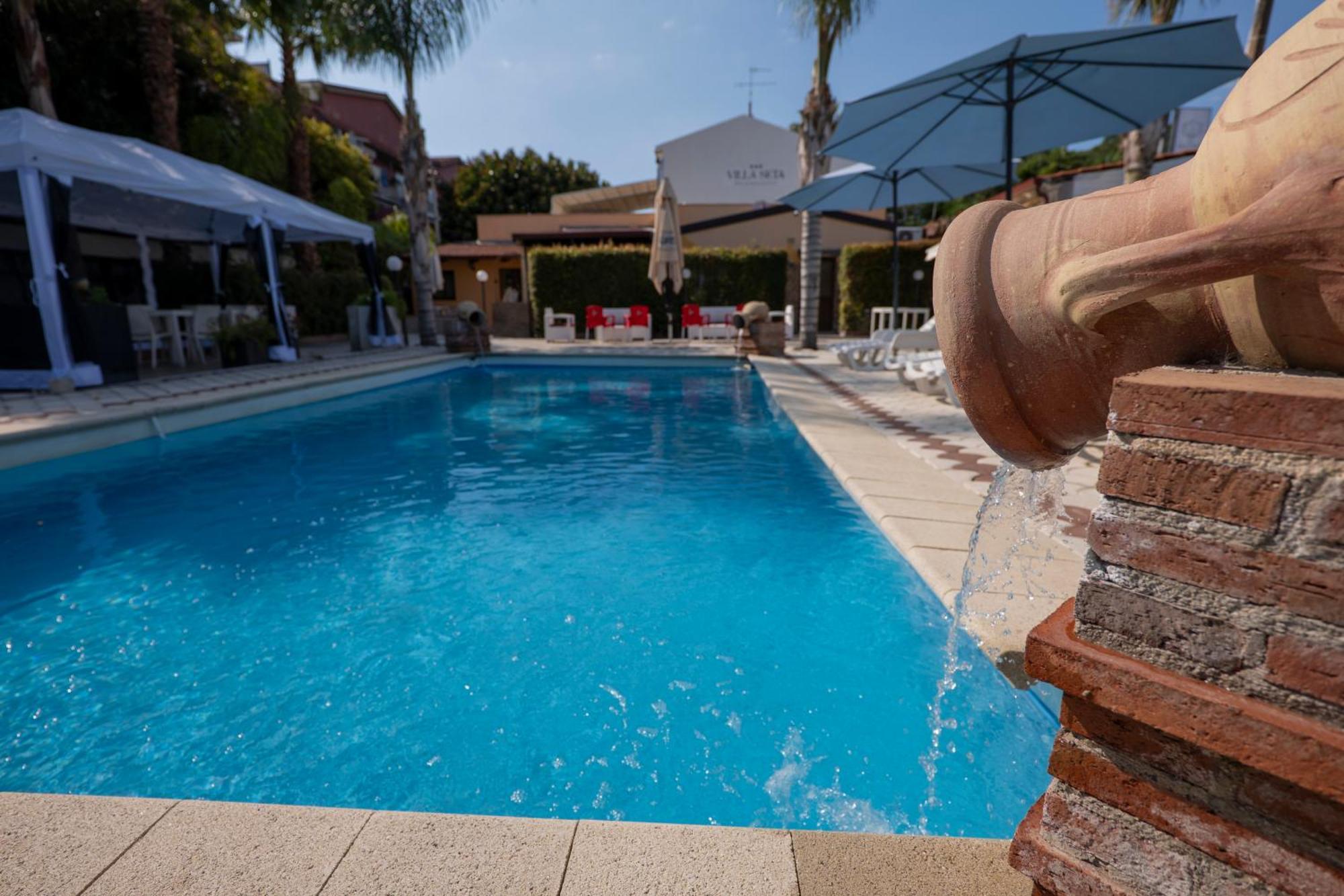 Villa Seta จีอาร์ดีนี นักซอส ภายนอก รูปภาพ