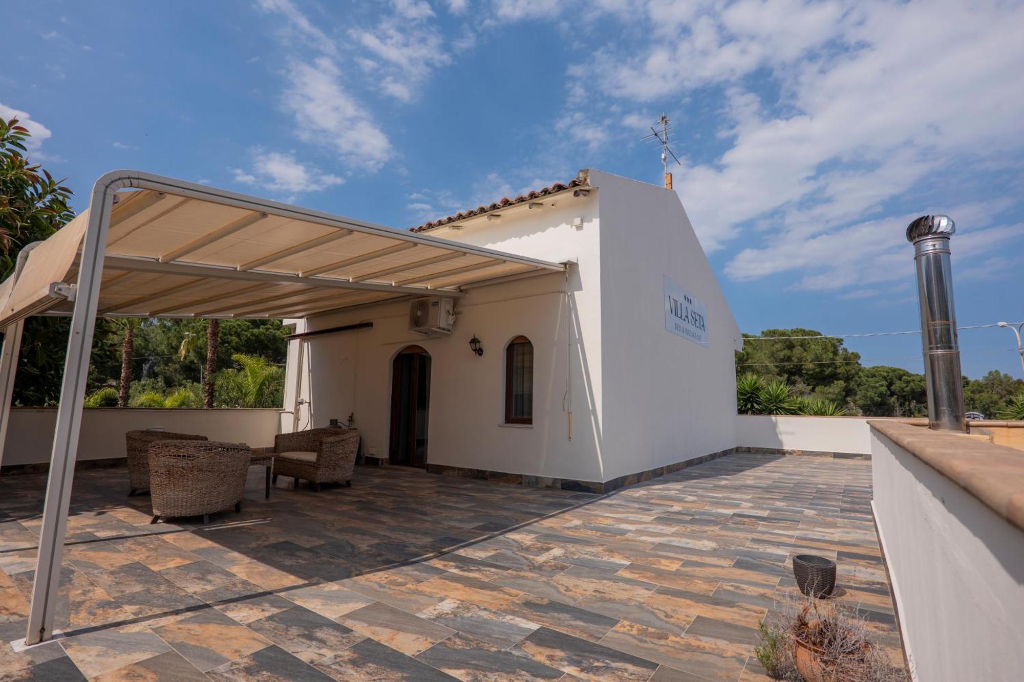Villa Seta จีอาร์ดีนี นักซอส ภายนอก รูปภาพ